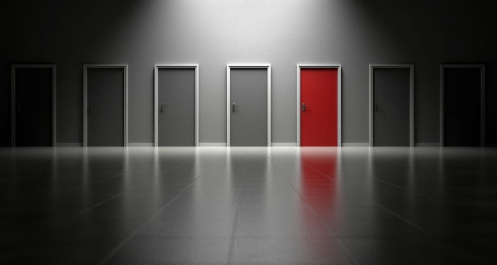 doors representing deciding between MBA program acceptances